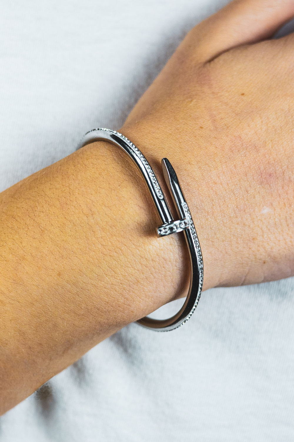 TENACE – Bracciale chiodo con zirconi